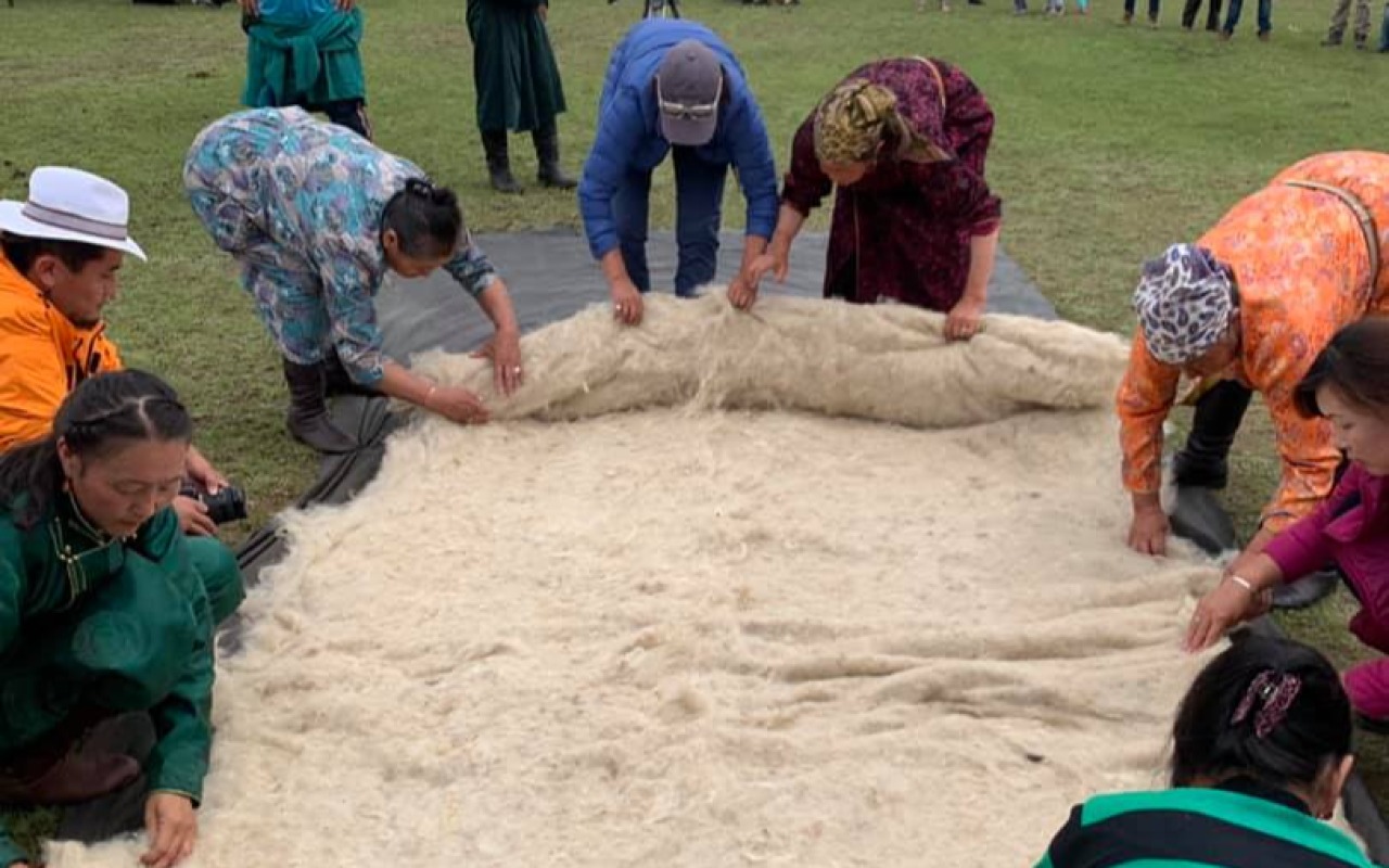 Nomads are making a felt in traditional way | Premium Travel Mongolia